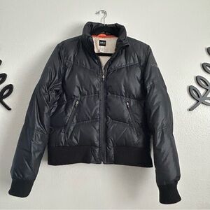 VSX Victoria’s Secret Black Quilted Puffer Jacket with Orange Trim